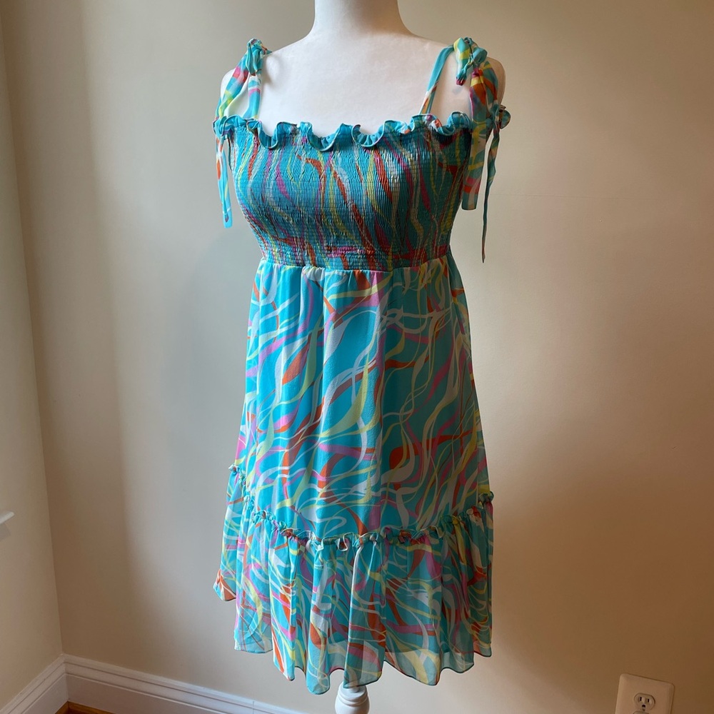 BCBG Max Azria 100% silk tie or strapless ruffle dress. Size M blue